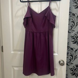 Purple mini dress with peekaboo back opening